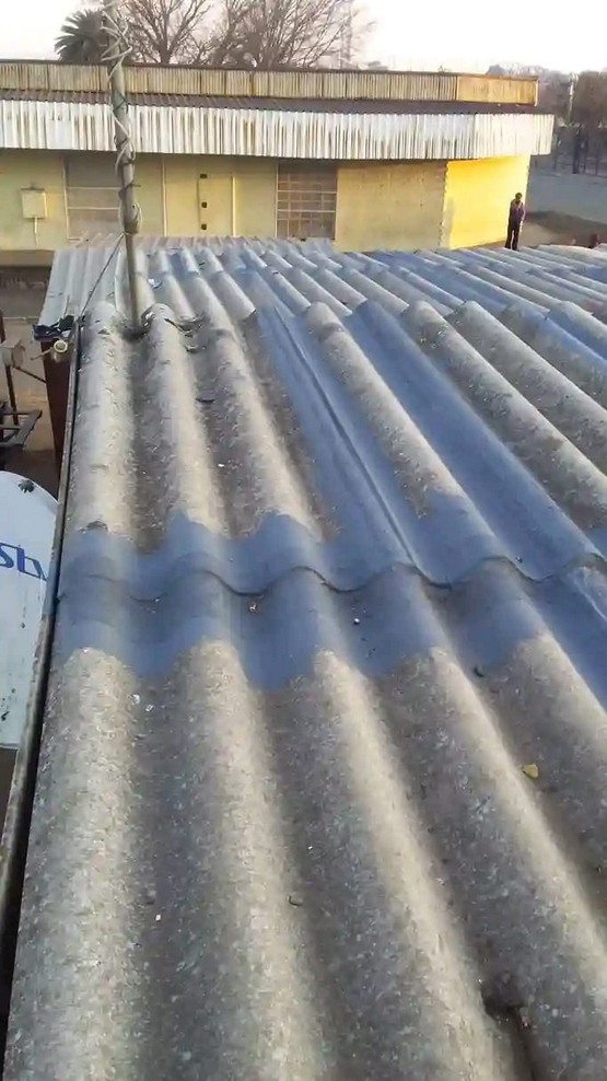 Roof Refinish — Roofing project by The 2 Handyman Team